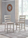 Skempton - Upholstered Barstool (Set of 2) - White – Stool Sets by Signature Design by Ashley® at Furniture Wholesale Plus , Nashville furniture store