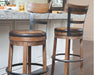 Pinnadel - Swivel Barstool – Counter Height (24"-27") by Signature Design by Ashley® at Furniture Wholesale Plus , Nashville furniture store