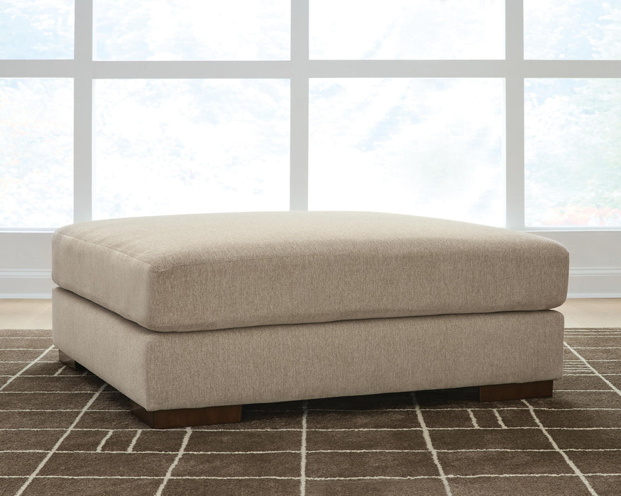 Linenhause - Oversized Accent Ottoman - Dune – Accent Ottomans by Benchcraft® at Furniture Wholesale Plus , Nashville furniture store