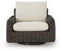 Kimora - Beige / Dark Brown - Swivel Glider Lounge With Cushion - Premium Swivel Chairs from Signature Design by Ashley® - Just $908! Shop now at Furniture Wholesale Plus  We are the best furniture store in Nashville, Hendersonville, Goodlettsville, Madison, Antioch, Mount Juliet, Lebanon, Gallatin, Springfield, Murfreesboro, Franklin, Brentwood