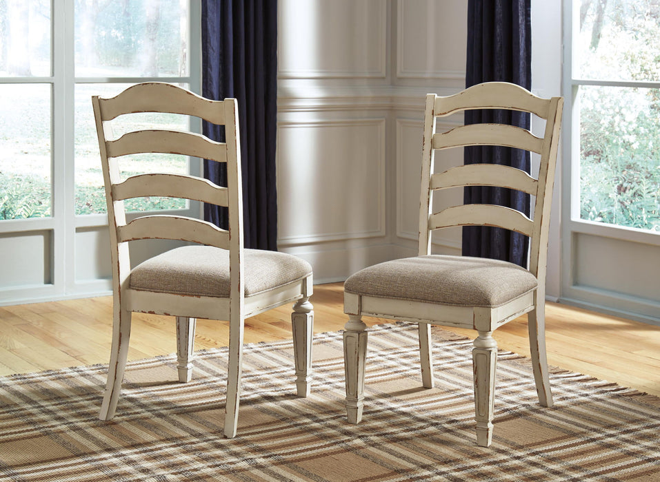 Realyn - Dining UPH Side Chair (Set of 2) - Ladderback - Chipped White – Chair Sets by Signature Design by Ashley® at Furniture Wholesale Plus , Nashville furniture store