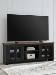 Wildenauer - XL TV Stand With Fireplace Option - Brown / Black – TV Stands by Signature Design by Ashley® at Furniture Wholesale Plus , Nashville furniture store