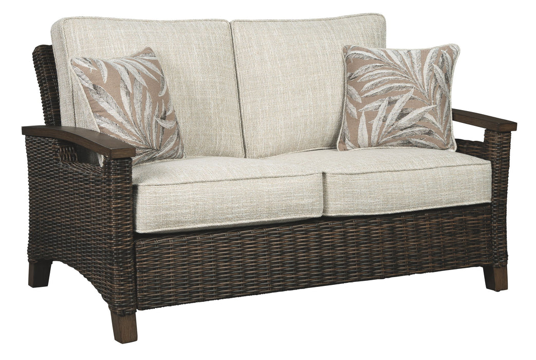 Paradise Trail - Medium Brown - Loveseat w/Cushion - Premium Loveseats from Signature Design by Ashley® - Just $1138! Shop now at Furniture Wholesale Plus  We are the best furniture store in Nashville, Hendersonville, Goodlettsville, Madison, Antioch, Mount Juliet, Lebanon, Gallatin, Springfield, Murfreesboro, Franklin, Brentwood