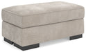 High Profile - Ottoman - Taupe – Upholstered Ottomans by Benchcraft® at Furniture Wholesale Plus , Nashville furniture store