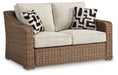 Beachcroft - Beige - Loveseat With Cushion - Premium Loveseats from Signature Design by Ashley® - Just $1098! Shop now at Furniture Wholesale Plus  We are the best furniture store in Nashville, Hendersonville, Goodlettsville, Madison, Antioch, Mount Juliet, Lebanon, Gallatin, Springfield, Murfreesboro, Franklin, Brentwood