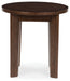 Korestone 2 - Round End Table - Dark Brown – End Tables by Signature Design by Ashley® at Furniture Wholesale Plus , Nashville furniture store