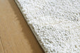 Unawick - Rug – Area Rugs by Signature Design by Ashley® at Furniture Wholesale Plus , Nashville furniture store