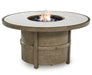 Rainier Ranch - Beige - Round Fire Pit Table - Premium Fire Pits from Signature Design by Ashley® - Just $1038! Shop now at Furniture Wholesale Plus  We are the best furniture store in Nashville, Hendersonville, Goodlettsville, Madison, Antioch, Mount Juliet, Lebanon, Gallatin, Springfield, Murfreesboro, Franklin, Brentwood