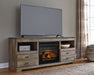 Trinell - 63" TV Stand With Glass/Stone Fireplace Insert - Brown – Fireplace TV Stands by Signature Design by Ashley® at Furniture Wholesale Plus , Nashville furniture store