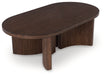 Korestone - Oval Cocktail Table - Dark Brown – Coffee Tables by Signature Design by Ashley® at Furniture Wholesale Plus , Nashville furniture store