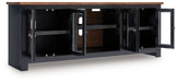Wildenauer - XL TV Stand With Fireplace Option - Brown / Black – TV Stands by Signature Design by Ashley® at Furniture Wholesale Plus , Nashville furniture store