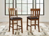 Ralene - Upholstered Barstool (Set of 2) - Medium Brown – Stool Sets by Signature Design by Ashley® at Furniture Wholesale Plus , Nashville furniture store