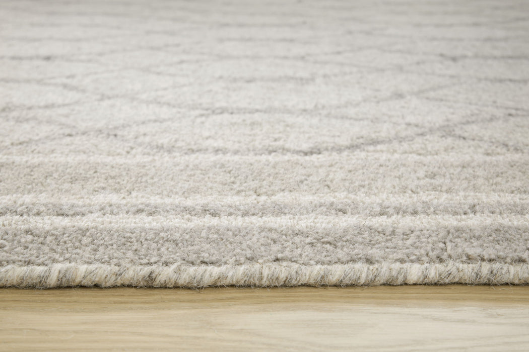 Wimney - Rug - Premium Area Rugs from Signature Design by Ashley® - Just $218! Shop now at Furniture Wholesale Plus  We are the best furniture store in Nashville, Hendersonville, Goodlettsville, Madison, Antioch, Mount Juliet, Lebanon, Gallatin, Springfield, Murfreesboro, Franklin, Brentwood