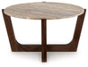 Tanidore - Round Cocktail Table - Warm Brown – Coffee Tables by Signature Design by Ashley® at Furniture Wholesale Plus , Nashville furniture store