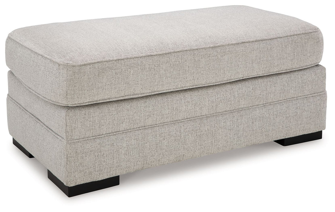 Eastonbridge - Ottoman - Shadow – Upholstered Ottomans by Benchcraft® at Furniture Wholesale Plus , Nashville furniture store