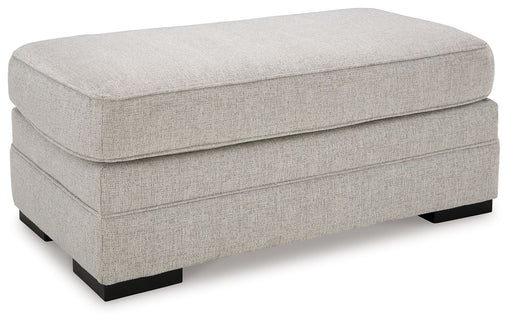 Eastonbridge - Shadow - Ottoman - Premium Upholstered Ottomans from Benchcraft® - Just $238! Shop now at Furniture Wholesale Plus  We are the best furniture store in Nashville, Hendersonville, Goodlettsville, Madison, Antioch, Mount Juliet, Lebanon, Gallatin, Springfield, Murfreesboro, Franklin, Brentwood