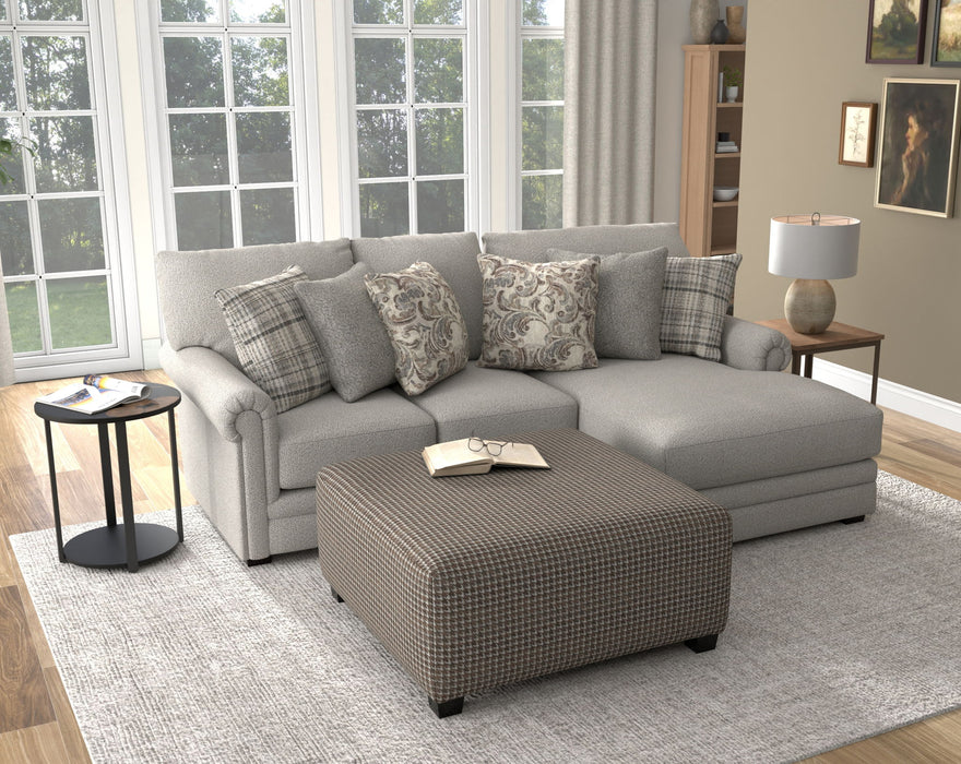 Livingston - Sectional With Comfort Coil Seating, 40" Cocktail Ottoman And Accent Pillows Included – 2 Piece Living Room Sets by Jackson at Furniture Wholesale Plus , Nashville furniture store