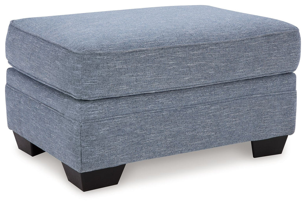 Carissa Manor - Ottoman - Denim – Upholstered Ottomans by Benchcraft® at Furniture Wholesale Plus , Nashville furniture store