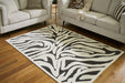 Thomwith - Rug – Washable Rugs by Signature Design by Ashley® at Furniture Wholesale Plus , Nashville furniture store