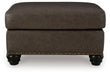 Roxmere - Ottoman - Umber – Upholstered Ottomans by Benchcraft® at Furniture Wholesale Plus , Nashville furniture store