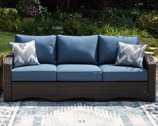 Windglow Outdoor Sofa with Cushion - Premium Outdoor Seating from Ashley Furniture - Just $779.96! Shop now at Furniture Wholesale Plus  We are the best furniture store in Nashville, Hendersonville, Goodlettsville, Madison, Antioch, Mount Juliet, Lebanon, Gallatin, Springfield, Murfreesboro, Franklin, Brentwood