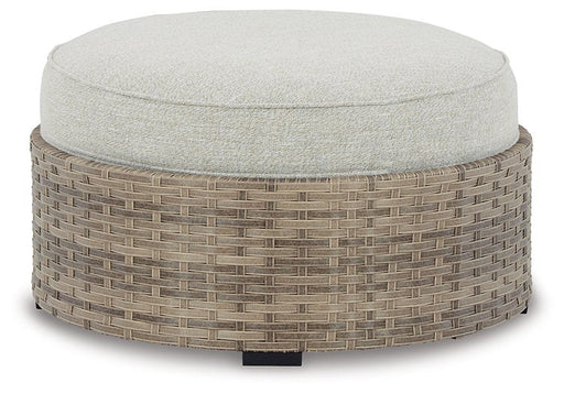 Calworth Outdoor Ottoman with Cushion - Premium Outdoor Ottoman from Ashley Furniture - Just $295.30! Shop now at Furniture Wholesale Plus  We are the best furniture store in Nashville, Hendersonville, Goodlettsville, Madison, Antioch, Mount Juliet, Lebanon, Gallatin, Springfield, Murfreesboro, Franklin, Brentwood
