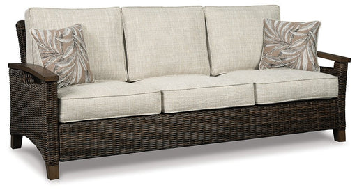 Paradise Trail Sofa with Cushion - Premium Outdoor Seating from Ashley Furniture - Just $1283.10! Shop now at Furniture Wholesale Plus  We are the best furniture store in Nashville, Hendersonville, Goodlettsville, Madison, Antioch, Mount Juliet, Lebanon, Gallatin, Springfield, Murfreesboro, Franklin, Brentwood