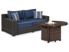 Grasson Lane Grasson Lane Nuvella Loveseat with Fire Pit Table - Premium Outdoor Table Set from Ashley Furniture - Just $2029.76! Shop now at Furniture Wholesale Plus  We are the best furniture store in Nashville, Hendersonville, Goodlettsville, Madison, Antioch, Mount Juliet, Lebanon, Gallatin, Springfield, Murfreesboro, Franklin, Brentwood