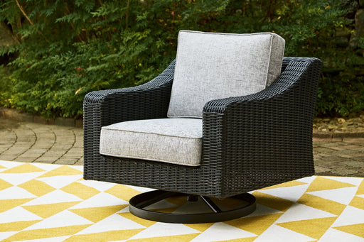 Beachcroft Outdoor Swivel Lounge with Cushion - Premium Outdoor Lounge Chair from Ashley Furniture - Just $648.38! Shop now at Furniture Wholesale Plus  We are the best furniture store in Nashville, Hendersonville, Goodlettsville, Madison, Antioch, Mount Juliet, Lebanon, Gallatin, Springfield, Murfreesboro, Franklin, Brentwood