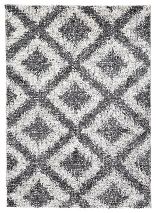 Junette 5'3" x 7'3" Rug - Premium Rug from Ashley Furniture - Just $99.19! Shop now at Furniture Wholesale Plus  We are the best furniture store in Nashville, Hendersonville, Goodlettsville, Madison, Antioch, Mount Juliet, Lebanon, Gallatin, Springfield, Murfreesboro, Franklin, Brentwood