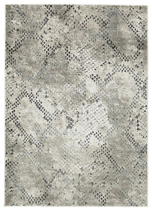 Poincilana 7'10" x 9'10" Rug - Premium Rug from Ashley Furniture - Just $366.28! Shop now at Furniture Wholesale Plus  We are the best furniture store in Nashville, Hendersonville, Goodlettsville, Madison, Antioch, Mount Juliet, Lebanon, Gallatin, Springfield, Murfreesboro, Franklin, Brentwood