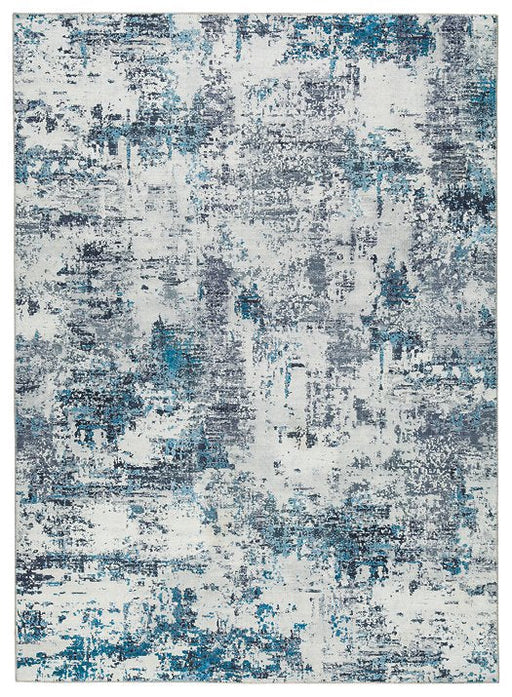 Putmins 7'10" x 10' Rug - Premium Rug from Ashley Furniture - Just $154.43! Shop now at Furniture Wholesale Plus  We are the best furniture store in Nashville, Hendersonville, Goodlettsville, Madison, Antioch, Mount Juliet, Lebanon, Gallatin, Springfield, Murfreesboro, Franklin, Brentwood