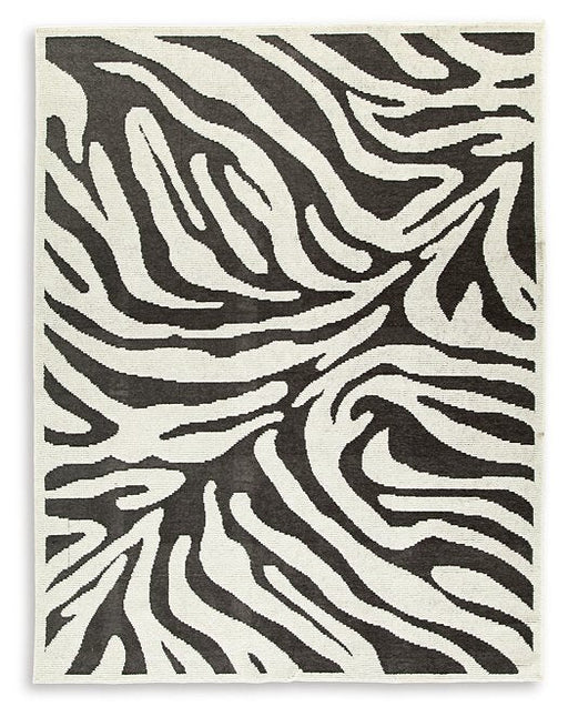 Thomwith 7'10" x 10'1" Rug - Premium Rug from Ashley Furniture - Just $242.70! Shop now at Furniture Wholesale Plus  We are the best furniture store in Nashville, Hendersonville, Goodlettsville, Madison, Antioch, Mount Juliet, Lebanon, Gallatin, Springfield, Murfreesboro, Franklin, Brentwood